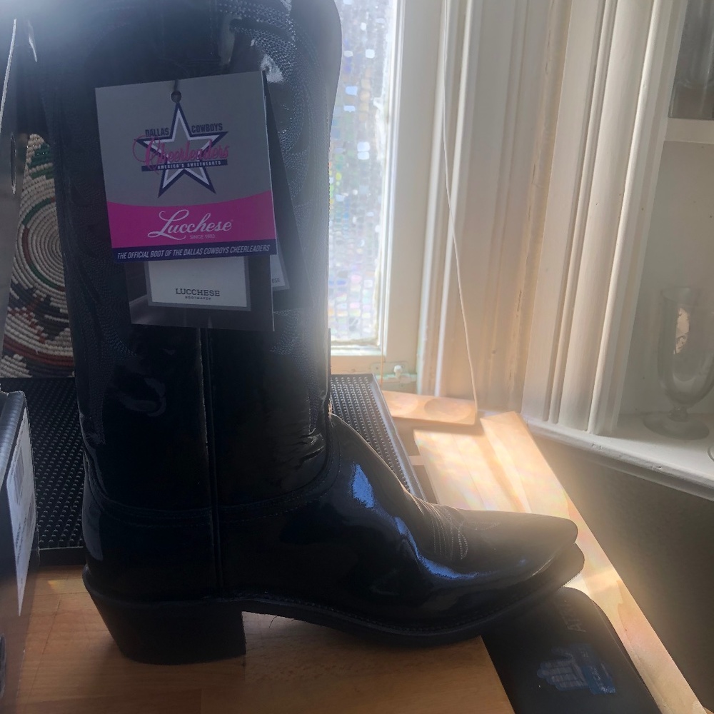 Lucchese boots two different pairs.